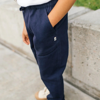 Navy blue pants worn by a child