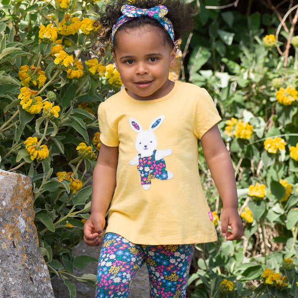 Girl wearing Kite organic Bunny balance tunic
