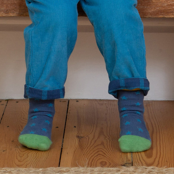 Boy wearing Kite organic Checkerboard socks