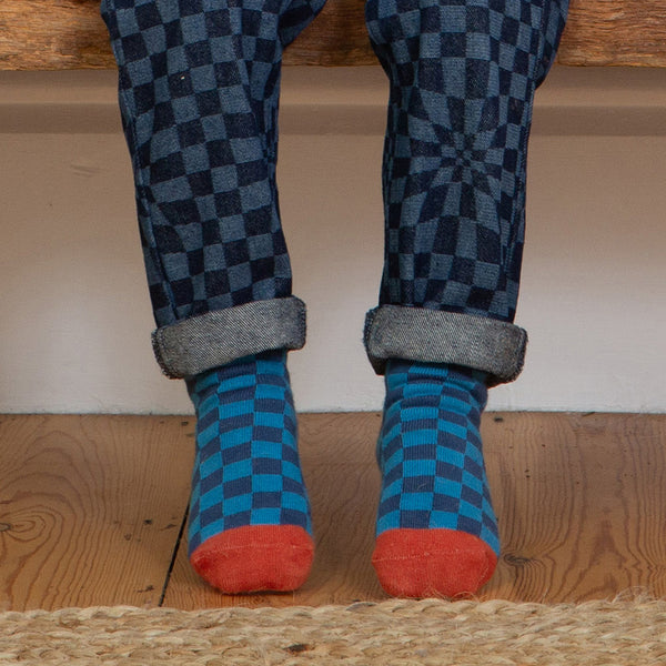 Boy wearing Kite organic Checkerboard socks