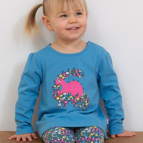 Girl wearing Kite organic Dinosaur play tunic