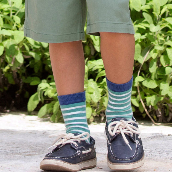 Boy wearing Kite organic Dinosaur socks