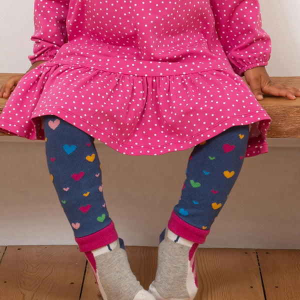 Girl wearing Kite organic Heart knit leggings