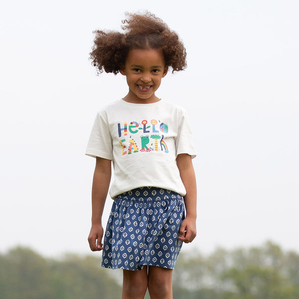 Girl wearing Kite organic Hello Earth t-shirt