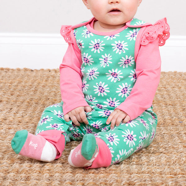 Baby wearing Kite organic Ladybug daisy socks