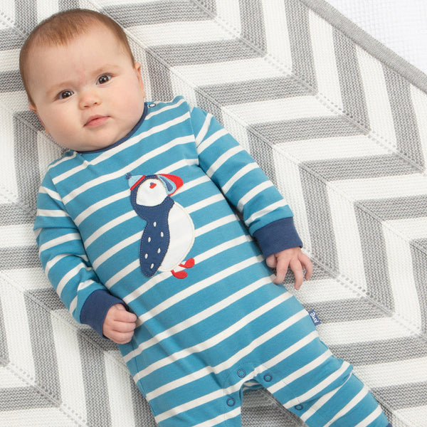 Baby wearing Kite organic Romper- puffin appliqué