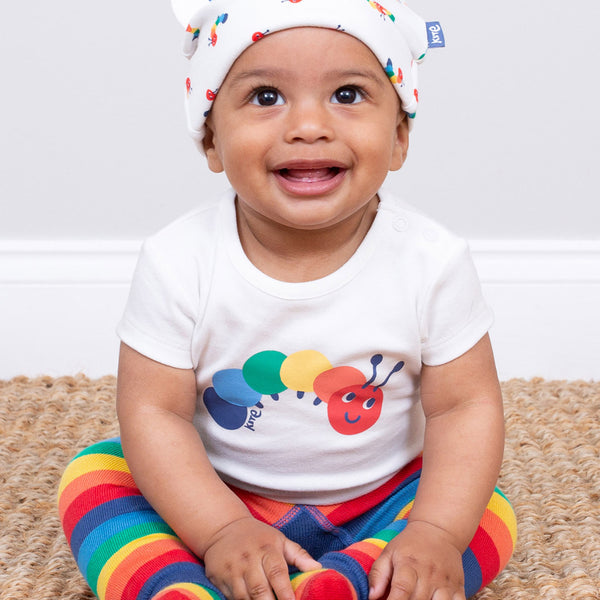 Baby wearing Kite organic Rainbow caterpillar bodysuit