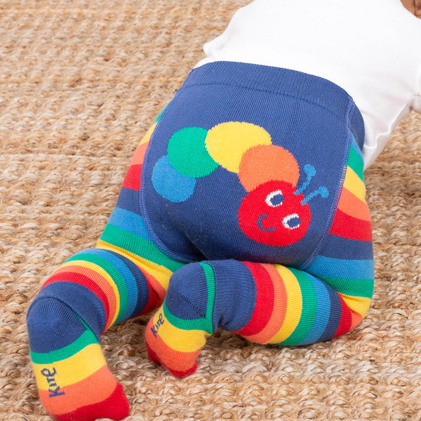 Baby wearing Kite organic Rainbow caterpillar knit leggings