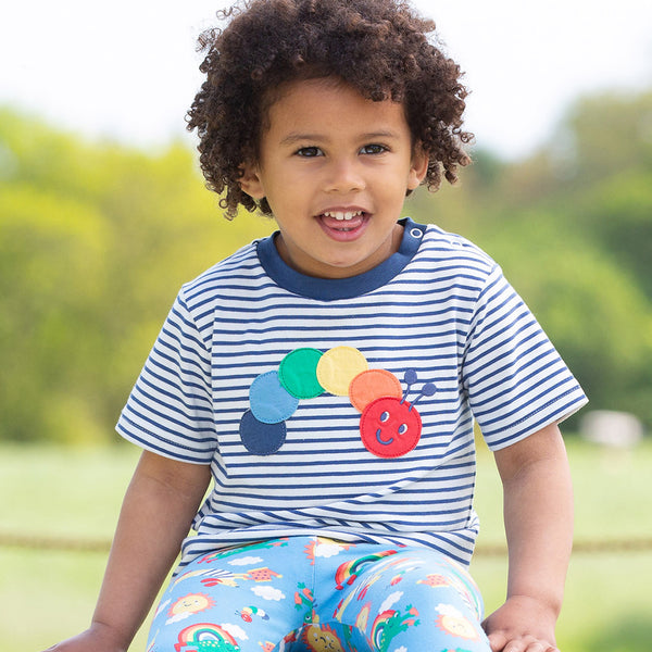 Boy wearing Kite organic Rainbow caterpillar t-shirt