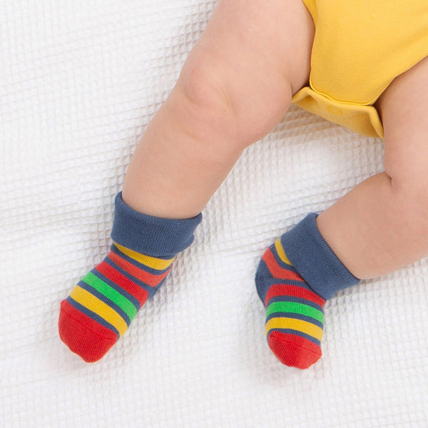 Baby wearing Kite organic Rainbow stripe socks