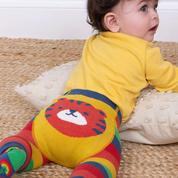 Baby wearing Kite organic Tiger knit leggings