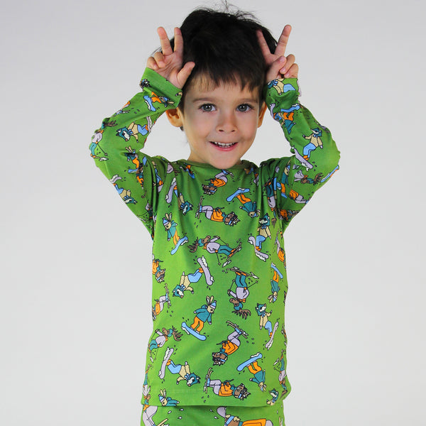 Boy wearing Smafolk organic Long sleeved t-shirt- skiing, moss green