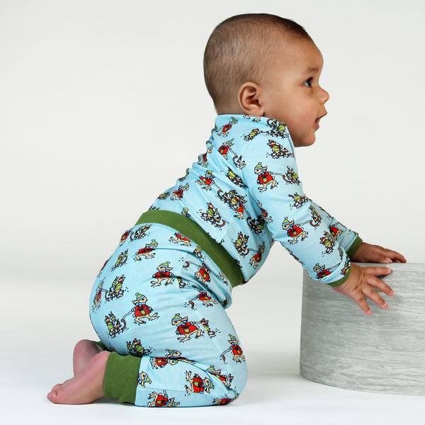 Baby wearing Smafolk organic Pants- sledding rabbits