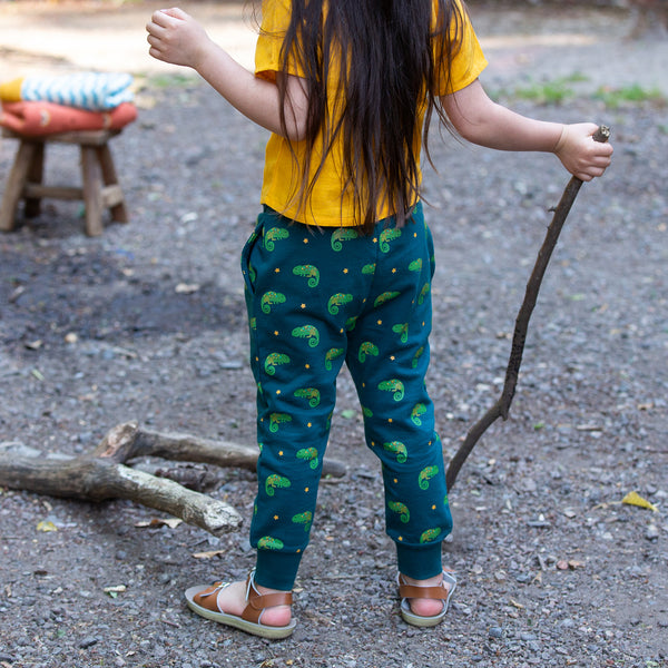 Girl wearing Little Green Radicals organic Joggers- little lizard