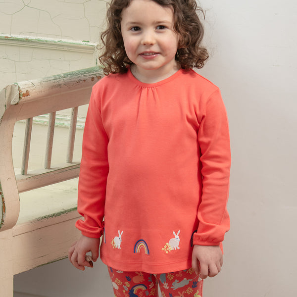 Girl wearing Piccalilly organic Tunic- bunny appliqué