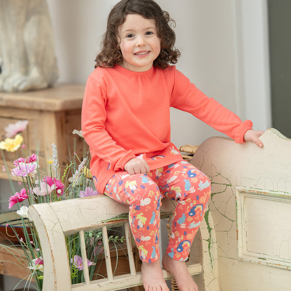 Girl wearing Piccalilly organic Pants- bunny hop