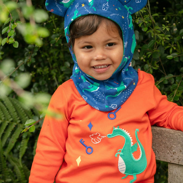 Boy wearing Piccalilly organic Long sleeve top- dragon appliqué