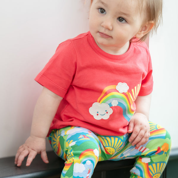 Baby wearing Piccalilly organic Top and pants set- island life