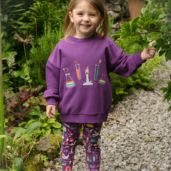 Girl wearing Piccalilly organic Pants- science