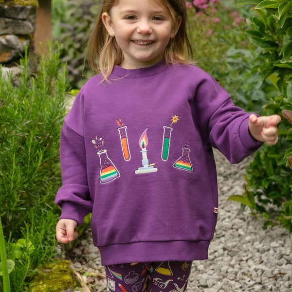 Girl wearing Piccalilly organic Sweatshirt- science