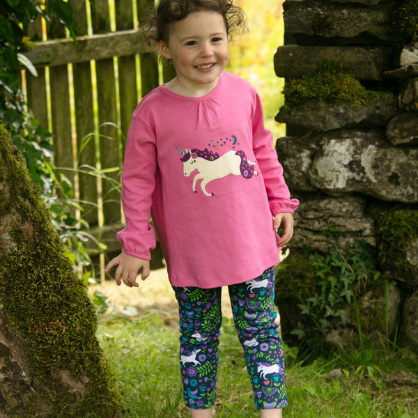 Girl wearing Piccalilly organic Pants- unicorn