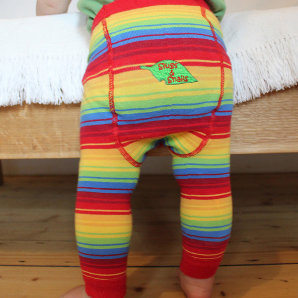 Baby wearing Slugs & Snails organic Rainbow footless tights