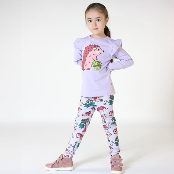 Girl wearing Smafolk organic Leggings- hedgehogs, orchid petal