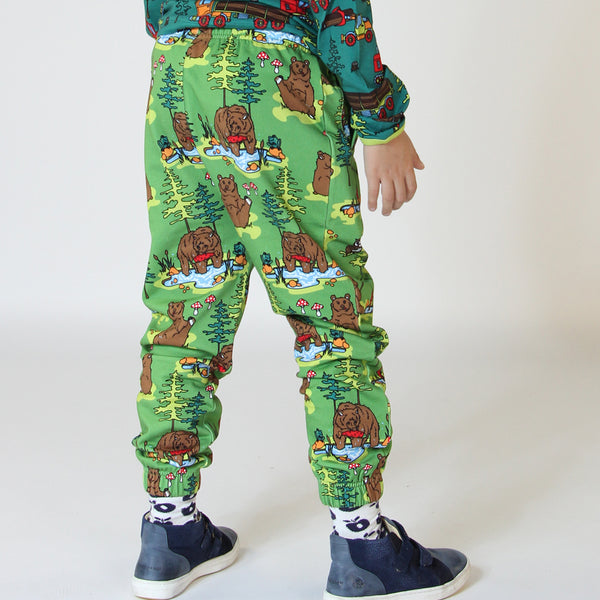 Boy wearing Smafolk organic Sweatpants- bears, moss green