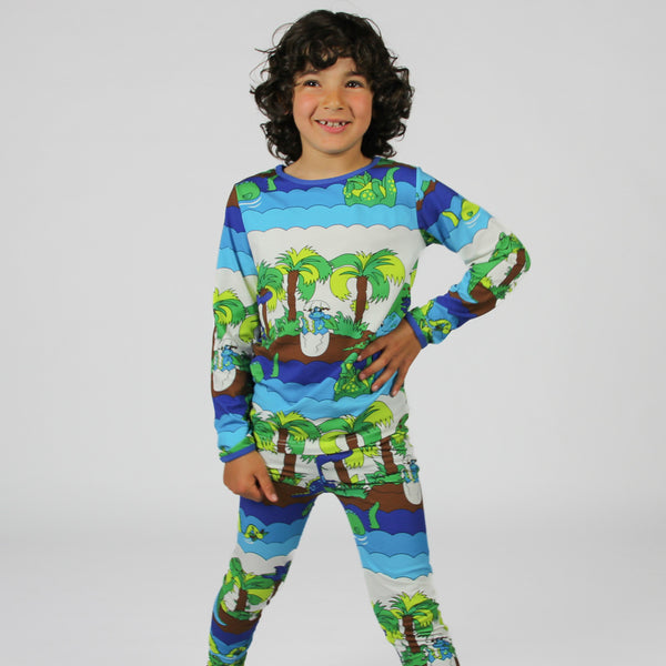 Boy wearing Smafolk organic Dinosaurs t-shirt, blue atoll