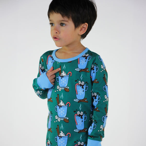 Boy wearing Smafolk organic Pajamas- hot chocolate, petroleum green