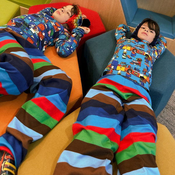Boys wearing Smafolk organic Sweatpants- medieval blue striped