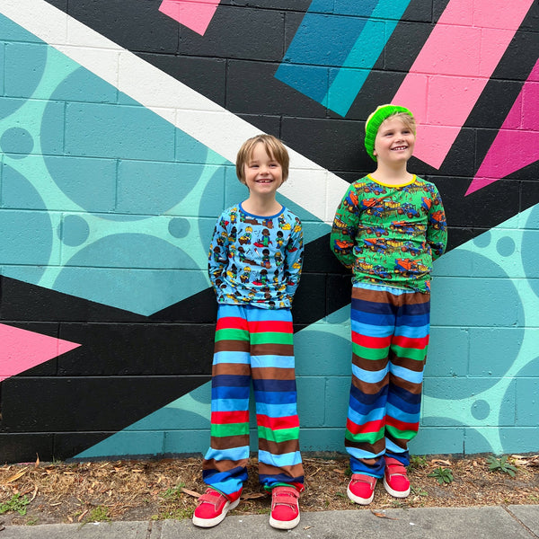 Boys wearing Smafolk organic Sweatpants- medieval blue striped