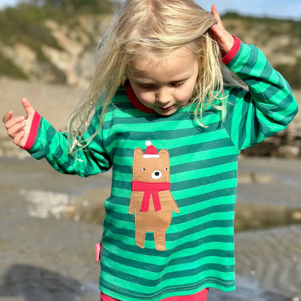 Girl wearing Toby Tiger organic Long sleeved t-shirt: Christmas bear appliqué