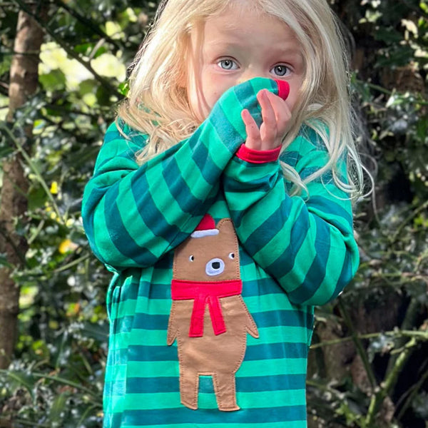 Girl wearing Toby Tiger organic Long sleeved t-shirt: Christmas bear appliqué