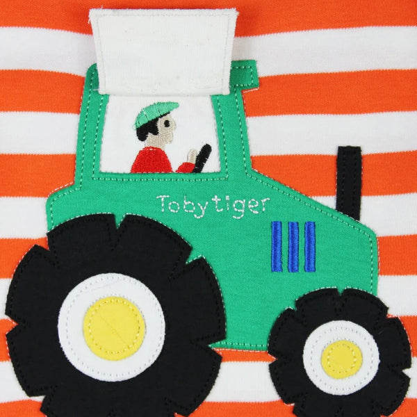 Toby Tiger organic Long sleeved t-shirt: tractor appliqué, closeup