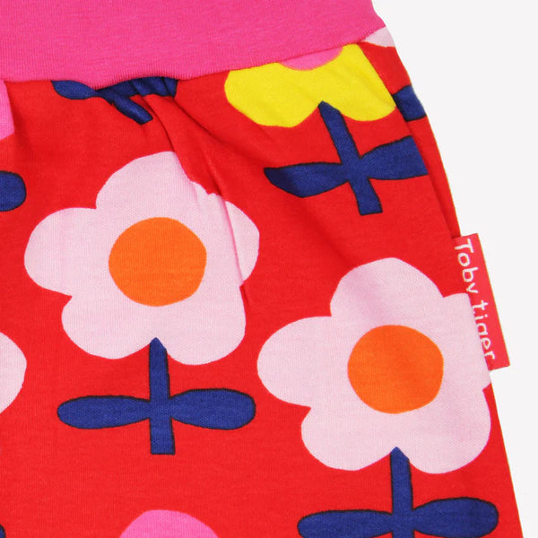 Toby Tiger organic Print pants- pink flower, closeup