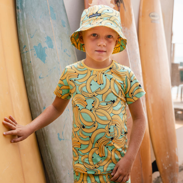 Boy wearing Villervalla organic Short sleeve top- bananas