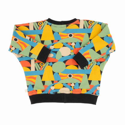Colorful geometric patterned sweatshirt on a black background
