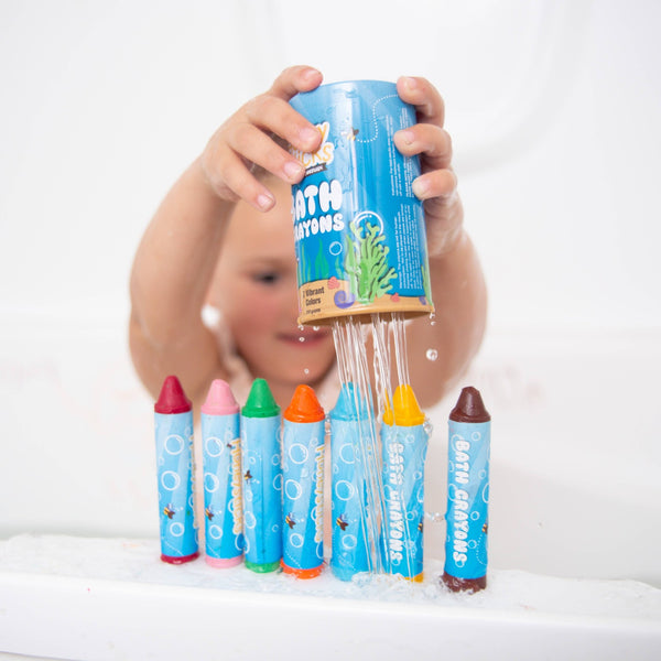Child playing with Honeysticks Bath crayons