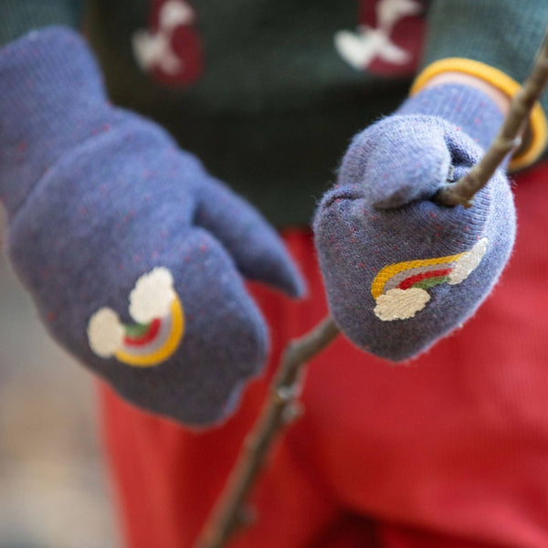 Child wearing Little Green Radicals Organic Knitted mittens- dreamy blue rainbow