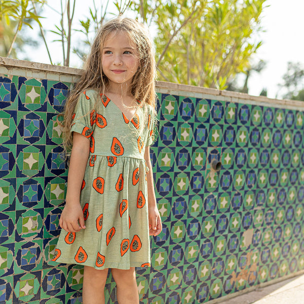 Girl wearing NAADA organic Papaya dress