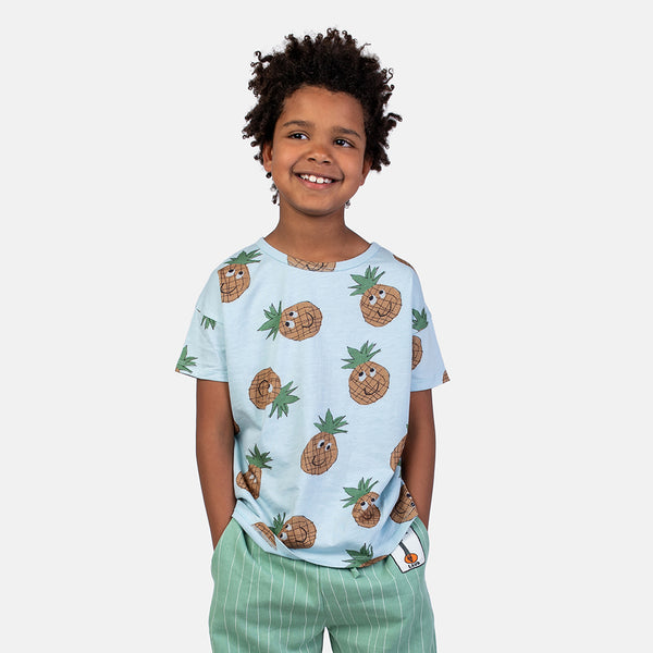 Boy wearing NAADA organic Pineapples t-shirt