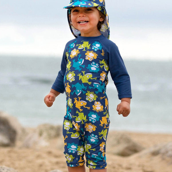 Boy wearing Kite Clothing Tree frog sunsuit