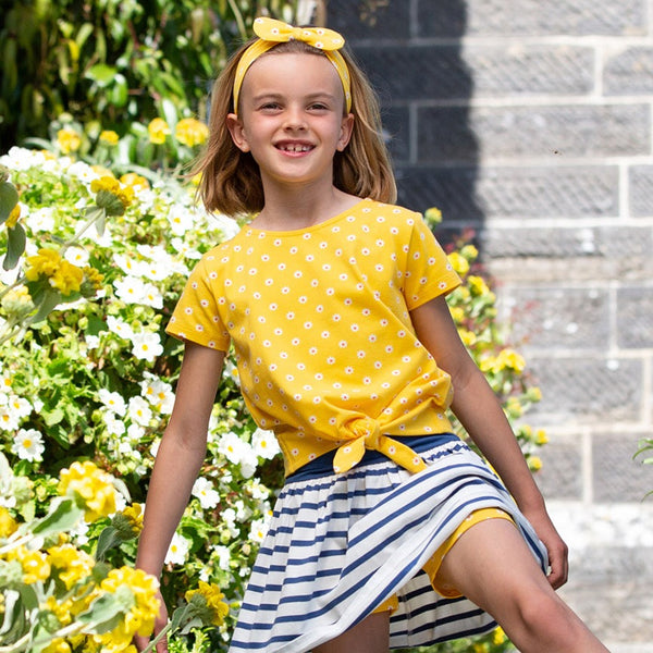 Girl wearing Kite Clothing Polka daisy tie top