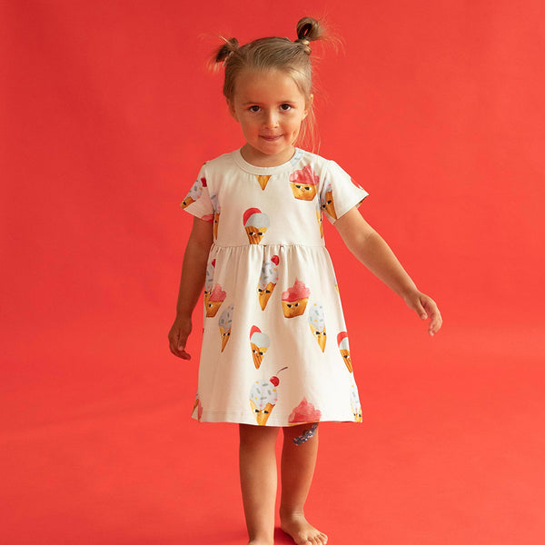 Girl wearing Curious Stories organic Short sleeve dress- ice cream