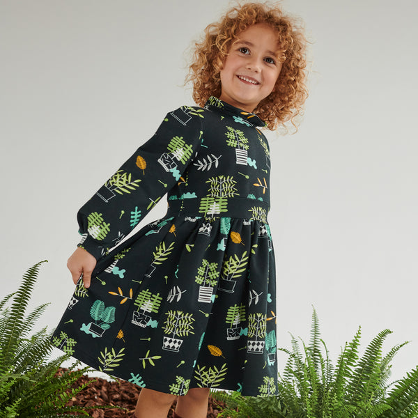 Girl wearing Raspberry Republic organic Dress- plantastic