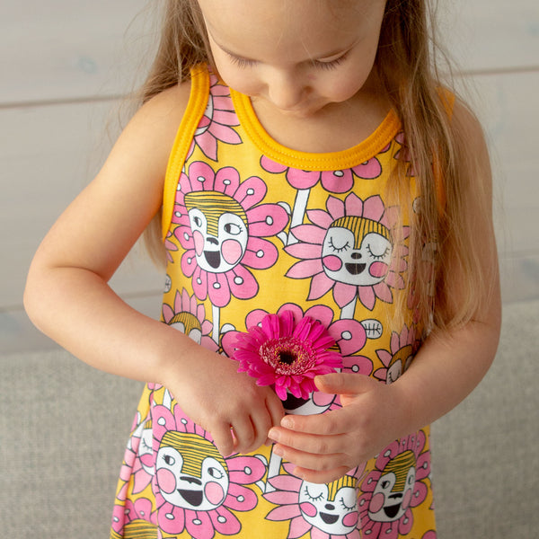 Girl wearing PaaPii Helina dress- sun & pink bloomination