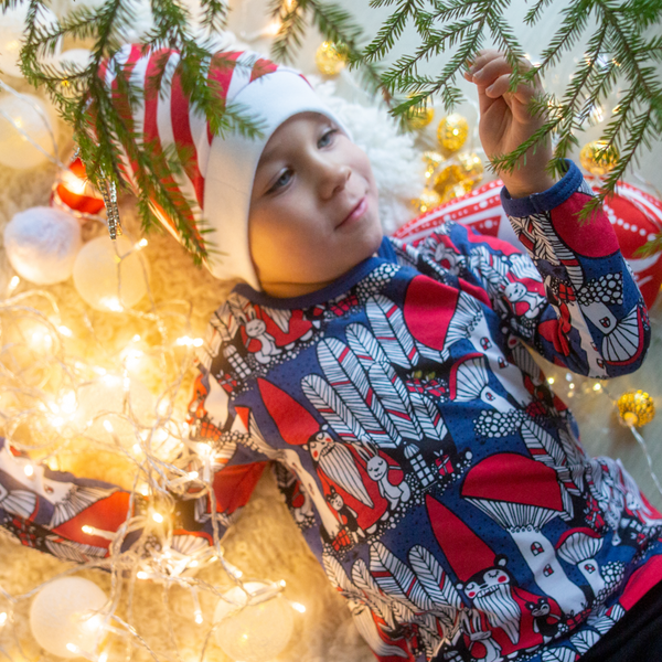 Boy wearing Uljas long sleeve shirt- Christmas forest