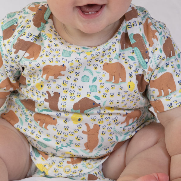 Baby wearing Piccalilly organic 2 pack bodysuits- baby bear