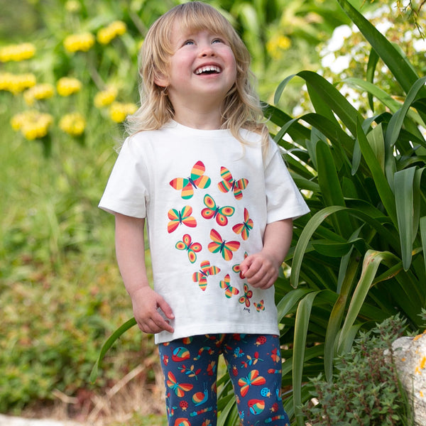 Girl wearing Kite clothing organic Butterflies t-shirt